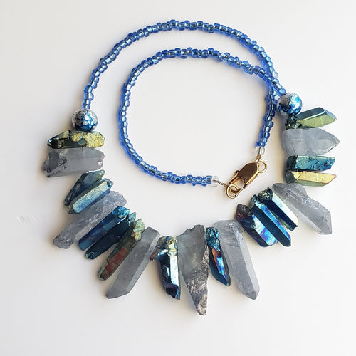 Colored quartz blue with glass beads 